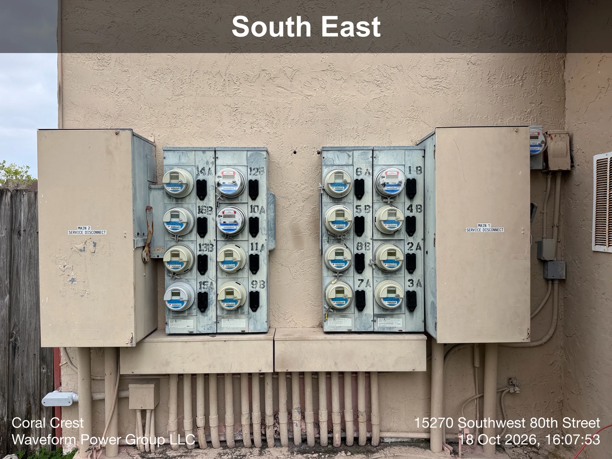 Coral Crest meter banks with labeled main disconnects and closed wireway covers after corrective work